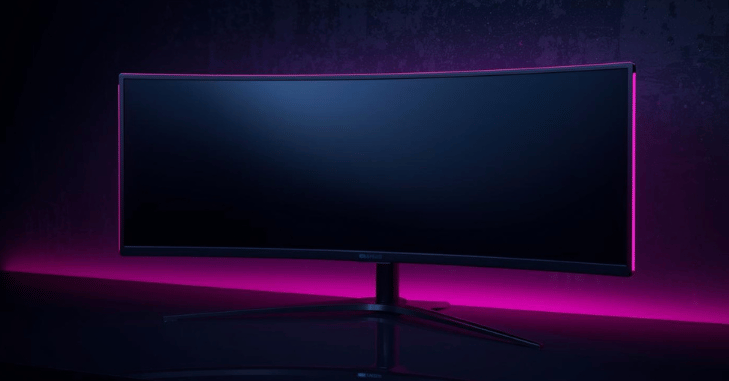 Curved gaming monitor angled on a dark desk