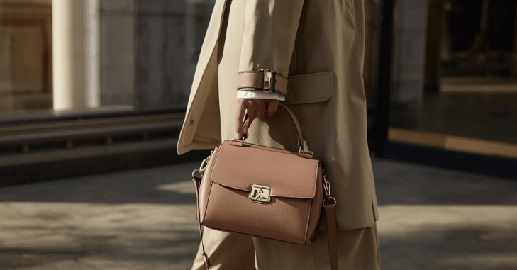 Bag styled with a tailored outfit for daytime wear