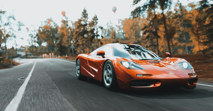 British supercar parked on a coastal road