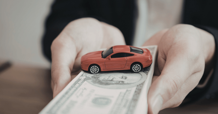 Owner cleaning a car ahead of a part exchange valuation